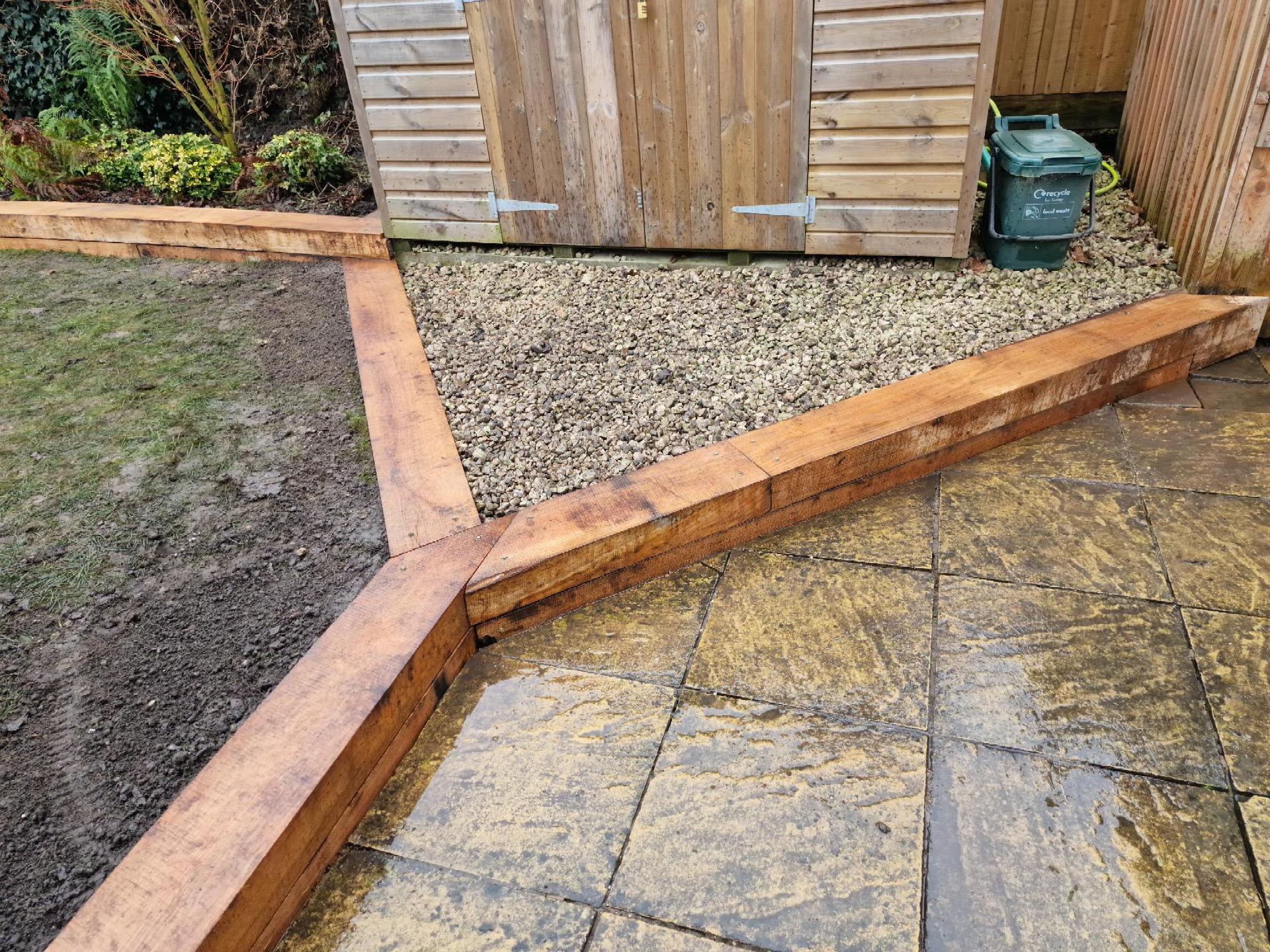 New sleepers edging pathway and lawn area.